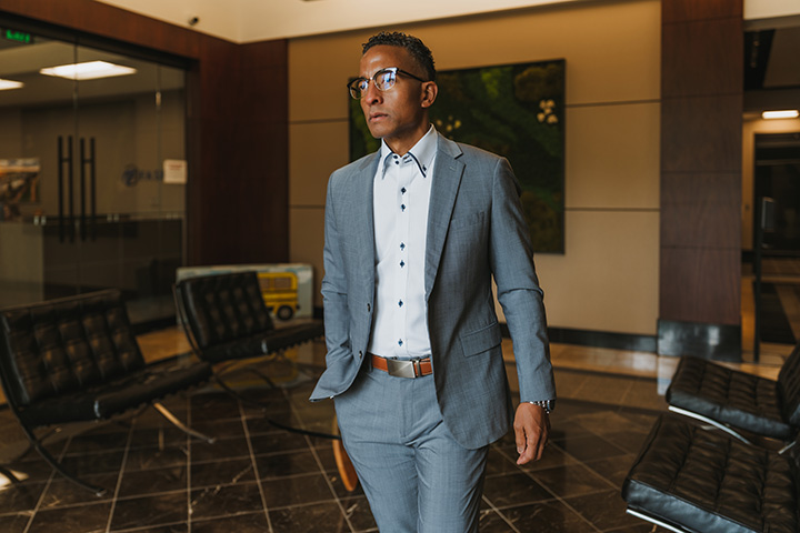 Lewayne Ballard in Suit Walking on Campus